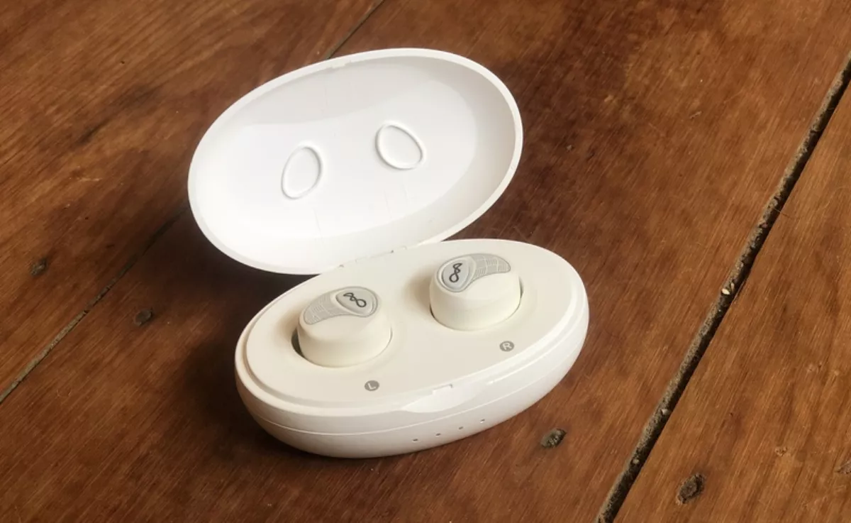 Open charging case with earbuds inside