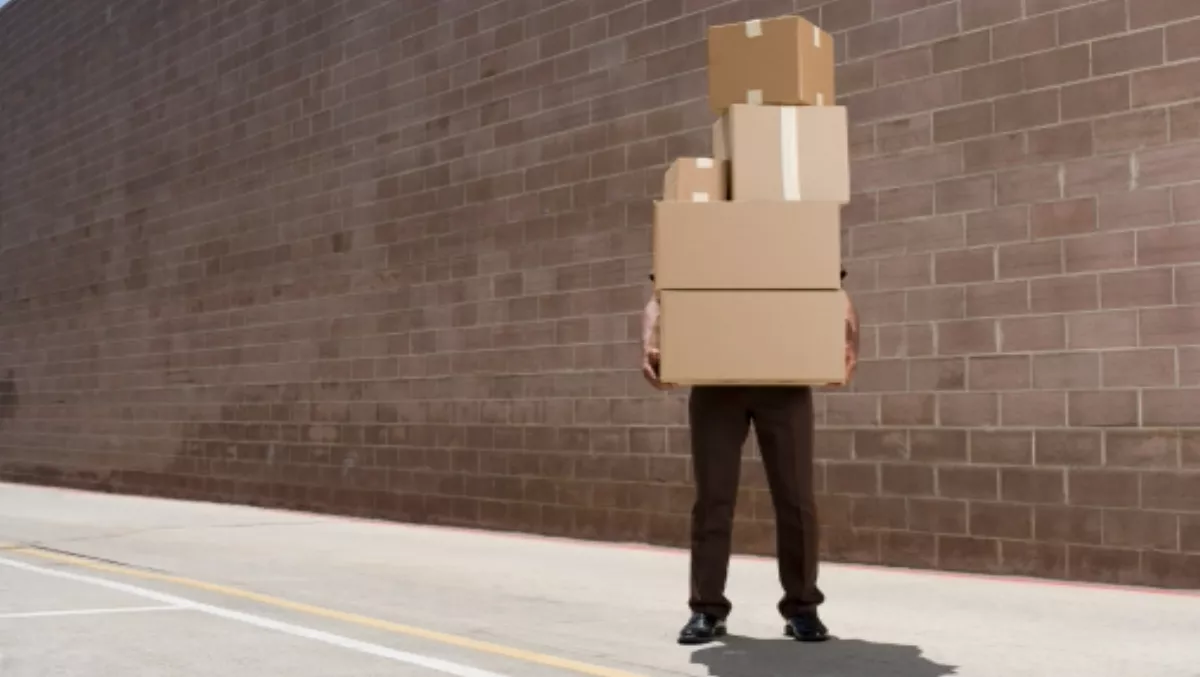 As Adobe abandons boxes, Microsoft keeps the faith